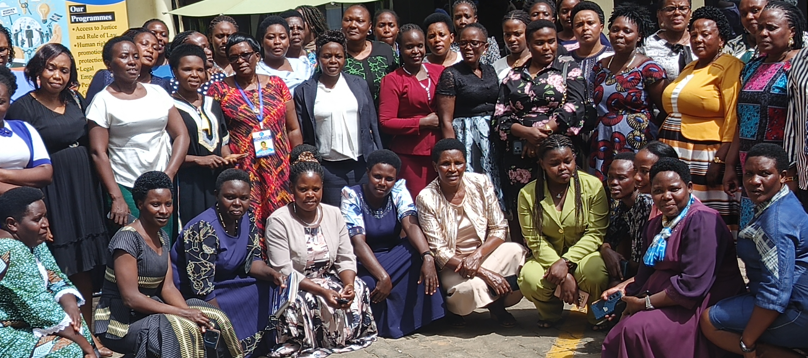 Lawyers consulting with community members in Uganda